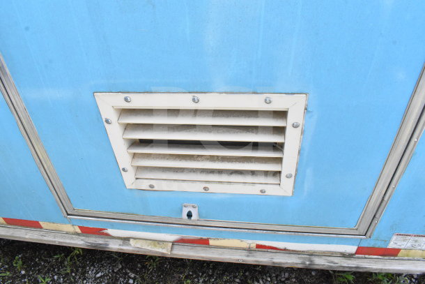 2020 Diamond Cargo food trailer side vent, blue exterior, durable construction, features grease hood, fryers, range, refrigeration.
