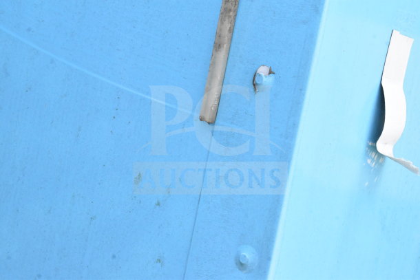 2020 Diamond Cargo food trailer panel with faded blue paint and visible wear marks. No labels or tags visible.