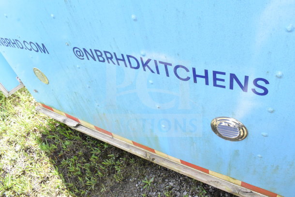 2020 Diamond Cargo 8.5'x24' food trailer exterior, blue with "@NBRHDKITCHENS" text. Features grease hood, suppression system, double fryer, range, refrigeration. VIN: 53NBE2422L1083693.