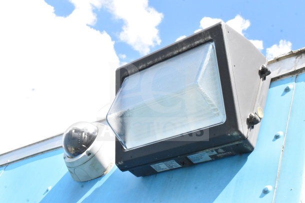 Exterior view of 2020 Diamond Cargo food trailer featuring security camera and exterior light fixture.