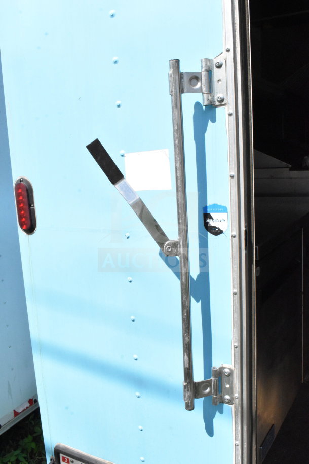 2020 Diamond Cargo 8.5'x24' food trailer with grease hood, suppression system, double fryer, and range. Light blue exterior.