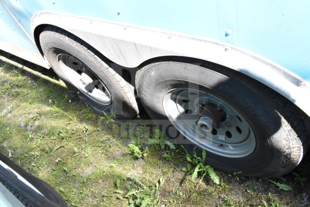 2020 Diamond Cargo 8.5'x24' food trailer tires and wheels, highlighting condition and tread depth.