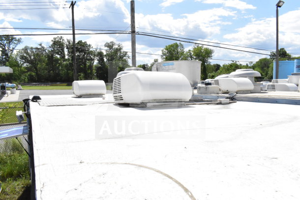 2020 Diamond Cargo 8.5'x24' food trailer roof view showing ventilation units and clear white exterior.