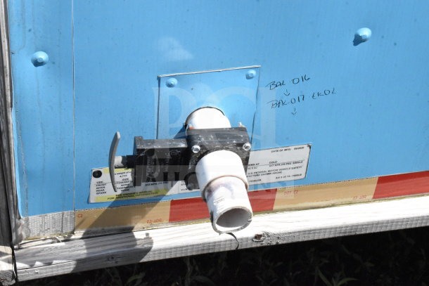 2020 Diamond Cargo 8.5'x24' food trailer valve detail, showing manufacturing labels and handwritten markings.