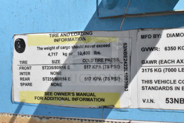 Label showing tire and loading information for a 2020 Diamond Cargo 8.5'x24' food trailer. VIN: 53NBE2422L1083693.