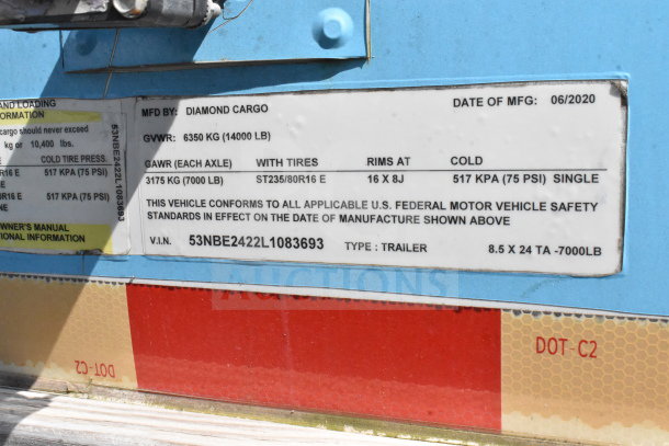 2020 Diamond Cargo 8.5'x24' food trailer label detailing specs: GVWR 6350kg, GAWR 3175kg, VIN 53NBE2422L1083693, trailer type.