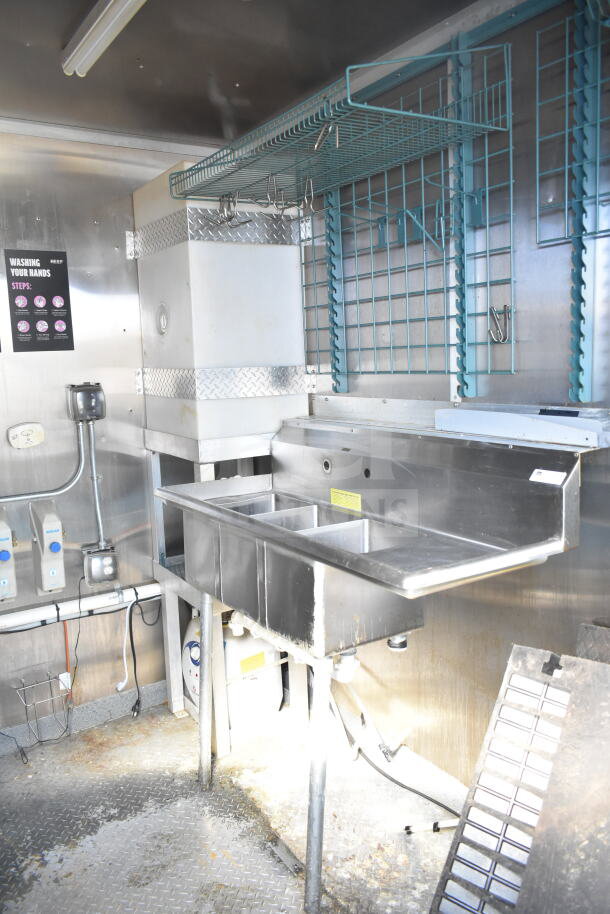 2021 Diamond Cargo 8.5'x24' food trailer interior with stainless steel sink, grease hood, and suppression system.