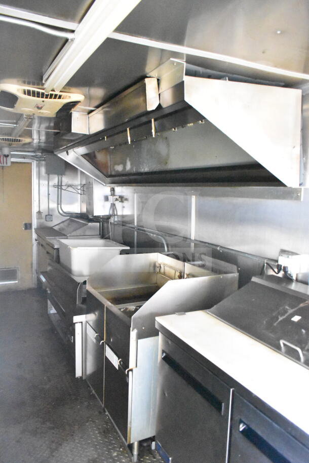 2021 Diamond Cargo 8.5'x24' food trailer, equipped with grease hood, suppression system, refrigeration, Frymaster gas fryer.