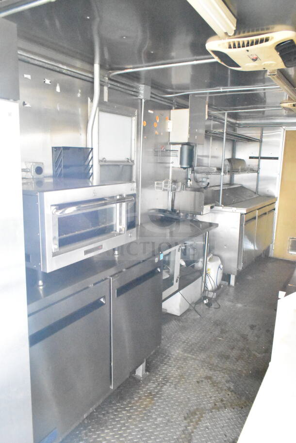 2021 Diamond Cargo 8.5'x24' food trailer; includes grease hood, suppression system, refrigeration, Frymaster gas fryer.