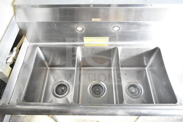 Stainless steel triple sink in 2021 Diamond Cargo 8.5'x24' food trailer, excellent condition, with label instructions.