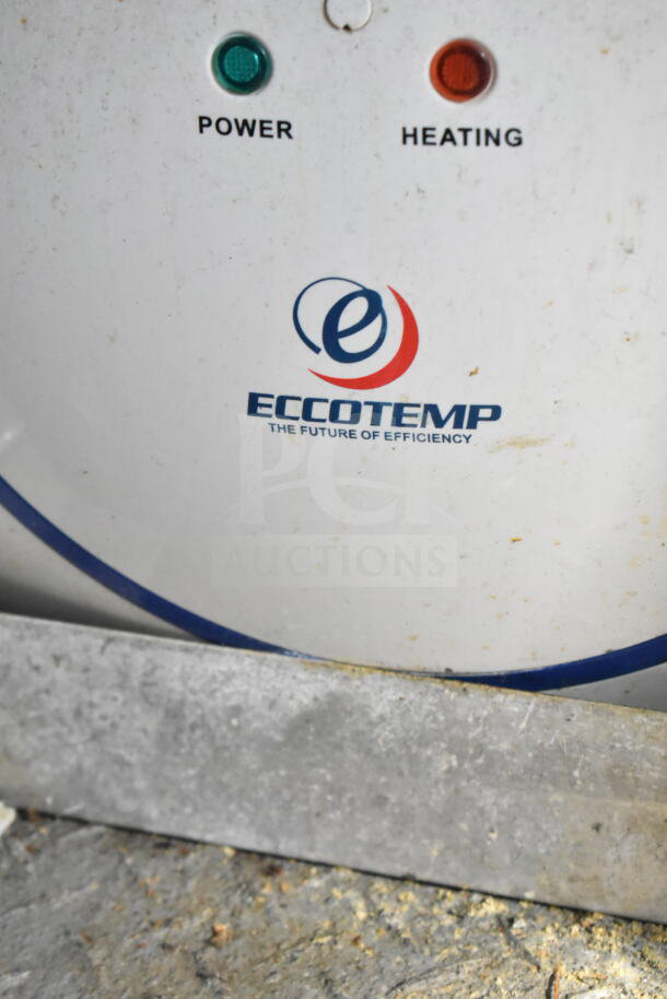 "2021 Diamond Cargo 8.5'x24' food trailer detail with Eccotemp heater showing power and heating indicators."
