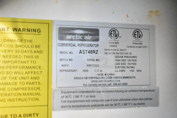 Arctic Air commercial refrigerator label, model AST48RZ, batch A2012, serial H20173323, refrigerant R290, 115V, 4.3 amps.