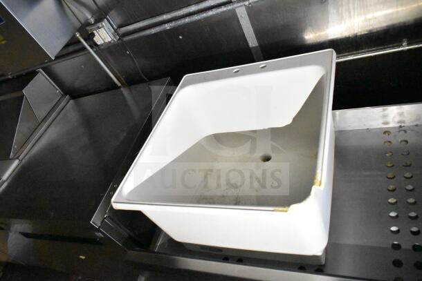 2021 Diamond Cargo food trailer interior showing a grease hood and stainless steel counter.