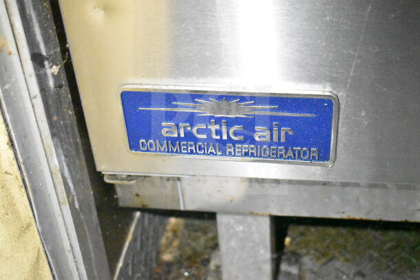 Arctic Air commercial refrigerator tag on 2021 Diamond Cargo food trailer, showcasing brand and type.