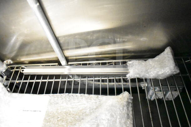 2021 Diamond Cargo 8.5'x24' food trailer, metal interior view, grease hood visible, wrapped components included.