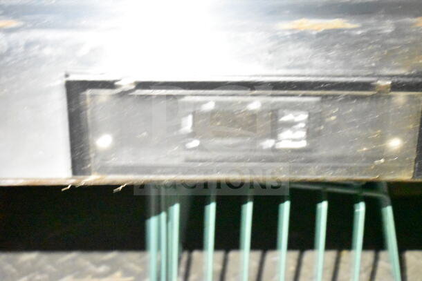 Blurred image of a 2021 Diamond Cargo food trailer label. Specific details are unclear. Verification recommended.