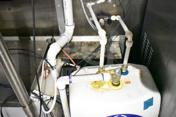 2021 Diamond Cargo food trailer interior showing piping and grease system components.