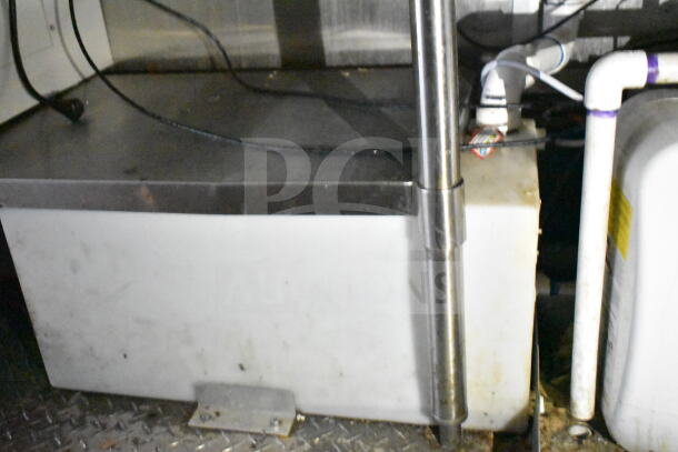 2021 Diamond Cargo 8.5'x24' food trailer interior, showing grease hood, suppression system, and utility connections.