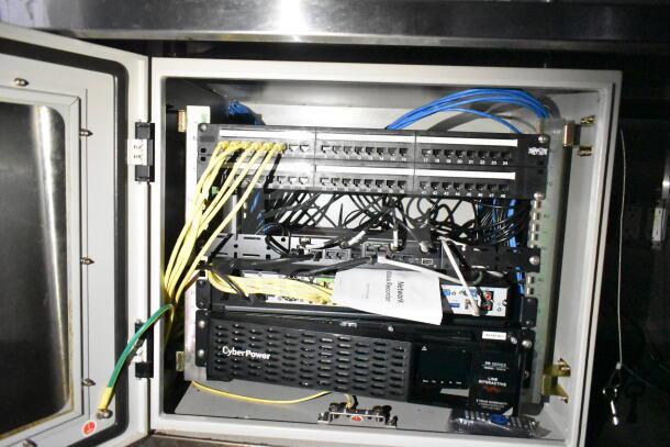 2021 Diamond Cargo 8.5'x24' food trailer interior with networking equipment, labeled cables, and CyberPower unit.