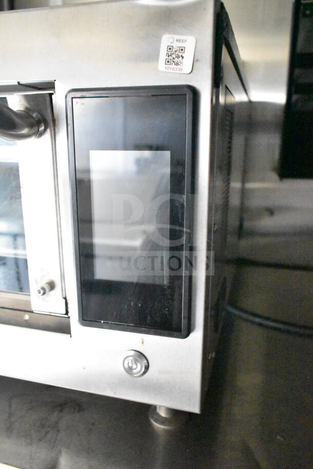 2021 Diamond Cargo 8.5'x24' food trailer interior showing stainless surface and control panel, includes grease hood and fryer.