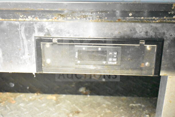 Control panel of 2021 Diamond Cargo 8.5'x24' food trailer, showing temperature settings and rust marks, in used condition.
