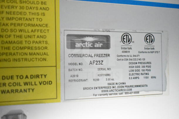 Arctic Air commercial freezer label showing model AF23Z, serial H20116995, and specs including refrigerant R290.