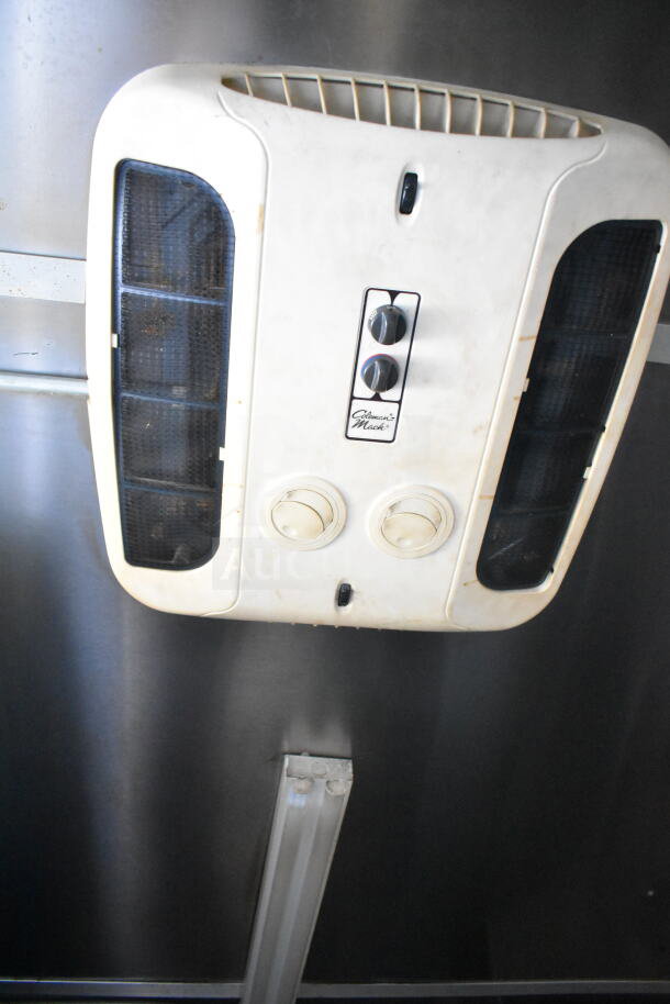 Interior view of a 2021 Diamond Cargo food trailer showing the Coleman-Mach air conditioner unit.