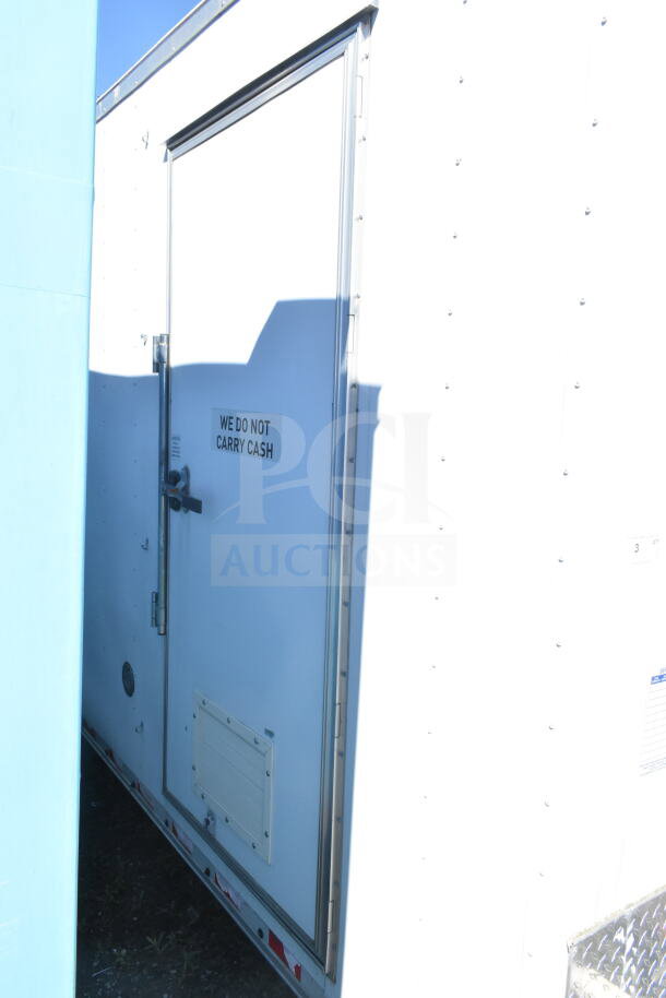 2021 Diamond Cargo 8.5'x24' food trailer, grease hood, suppression system, refrigeration, Frymaster fryer, "We Do Not Carry Cash" sign.