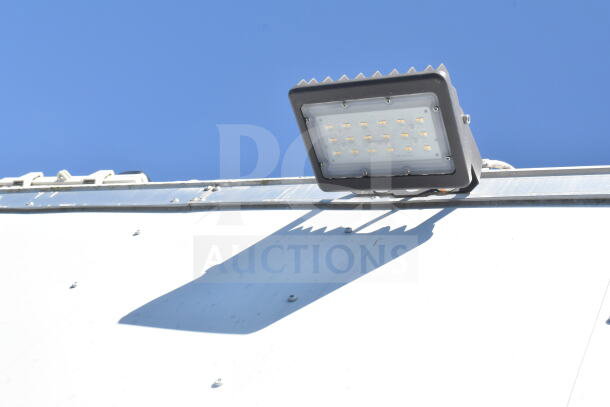 Roof-mounted exterior light on a 2021 Diamond Cargo 8.5'x24' food trailer, highlighting structural design.