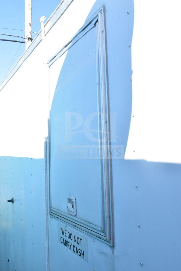 2021 Diamond Cargo 8.5'x24' food trailer exterior with door. Sign reads "We Do Not Carry Cash."