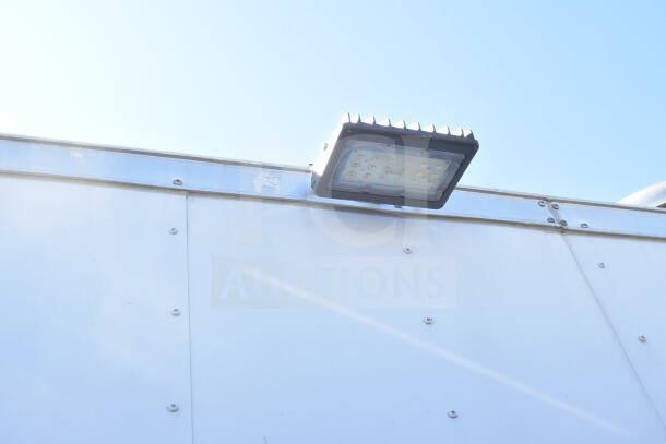 2021 Diamond Cargo 8.5'x24' food trailer exterior with mounted security light.
