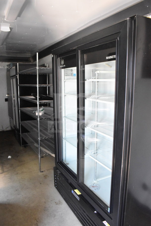 2021 Diamond Cargo 8.5'x24' food trailer interior showing commercial fridge, shelving, and clean flooring.