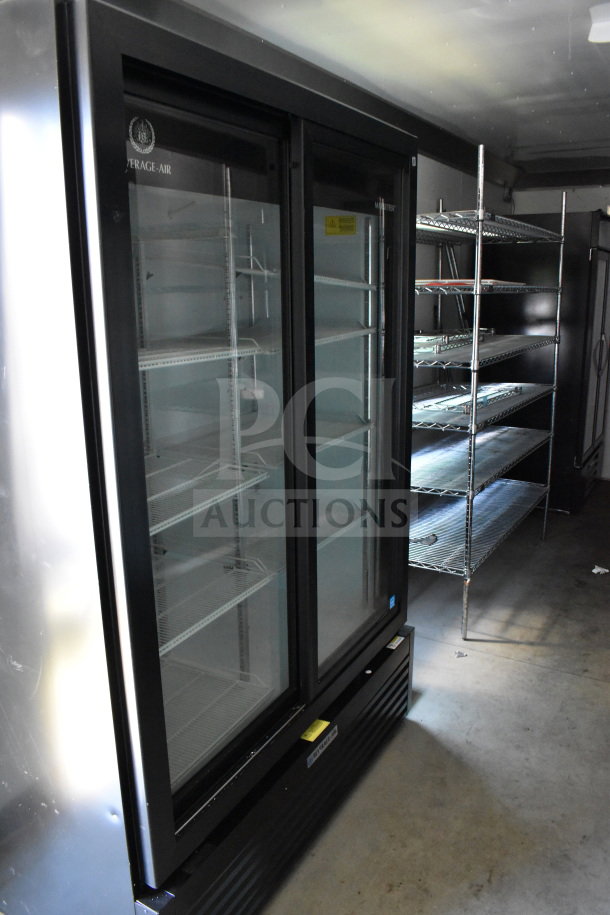 2021 Diamond Cargo 8.5'x24' food trailer interior with refrigeration unit and shelves, pristine condition.