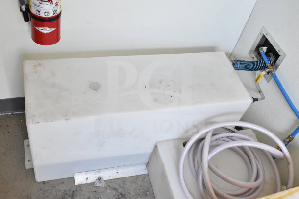2021 Diamond Cargo 8.5'x24' food trailer interior, showing a mounted fire extinguisher and utility connections.