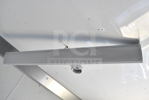 Interior ceiling view of 2021 Diamond Cargo 8.5'x24' Food Trailer, showing a light fixture. Clean, well-maintained condition.