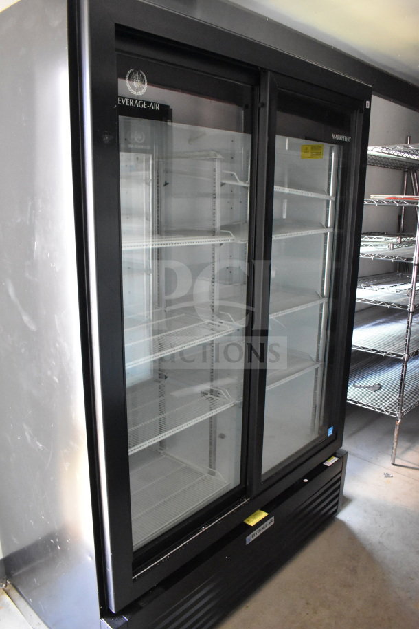 2021 Diamond Cargo 8.5'x24' cold food/beverage trailer interior, featuring a Beverage-Air Market refrigerator with double glass doors in excellent condition.