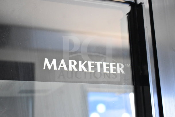 2021 Diamond Cargo 8.5'x24' Cold Food Trailer, brand mark "Marketeer" on glass window, VIN: 53NBE2424M1089867.