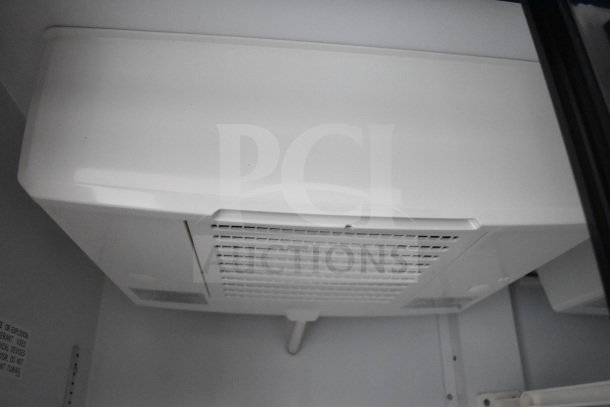 2021 Diamond Cargo 8.5'x24' cold food trailer interior, featuring refrigeration unit.