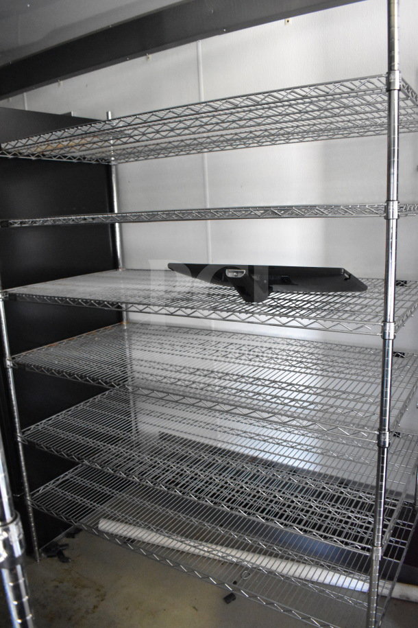2021 Diamond Cargo 8.5'x24' trailer interior with wire shelving, suitable for cold food/beverage storage, VIN 53NBE2424M1089867.