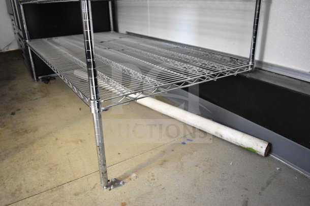 2021 Diamond Cargo 8.5'x24' cold food/beverage trailer interior, showing metal shelving. VIN: 53NBE2424M1089867.