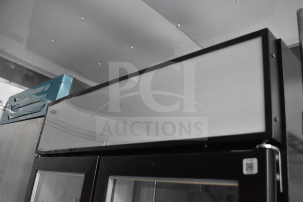 2021 Diamond Cargo 8.5'x24' cold food/beverage trailer interior, features large refrigeration unit, excellent condition.