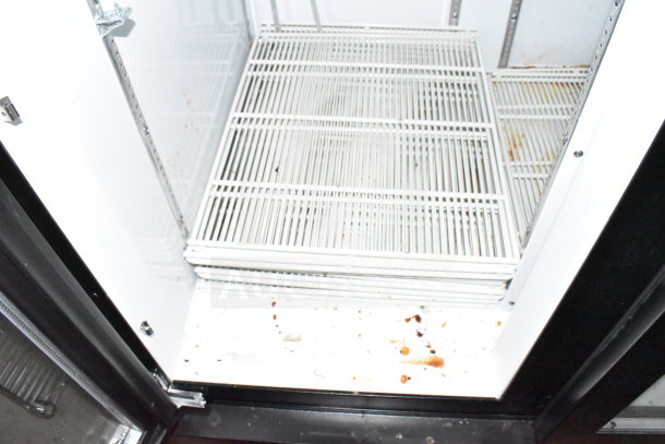 2021 Diamond Cargo 8.5'x24' trailer interior with shelving, indicating cold storage use. Some stains visible, inspect for condition.