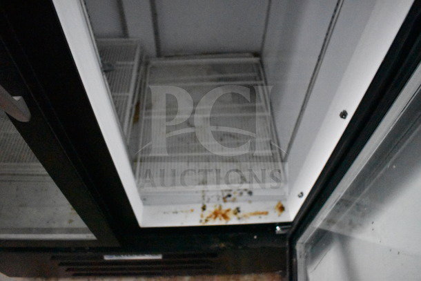 2021 Diamond Cargo 8.5'x24' cold food trailer interior, visible shelving. Some discoloration on shelves indicates usage.