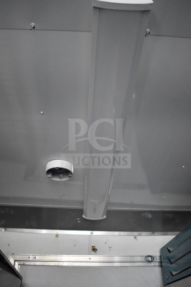 2021 Diamond Cargo 8.5'x24' trailer interior view, shows lighting and ventilation. Clean, spacious setup for food/beverage use.