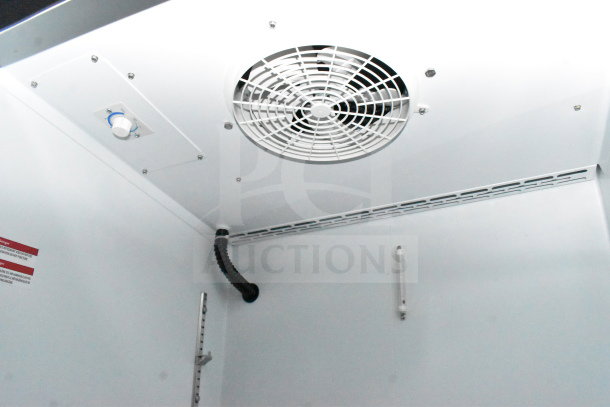 2021 Diamond Cargo cold food trailer interior with ceiling fan and control switch, pristine condition.