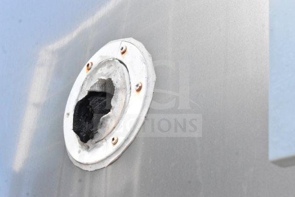 Damaged vent on 2021 Diamond Cargo 8.5'x24' Cold Food/Beverage Trailer; outer surface shows wear, indicating necessary repair.