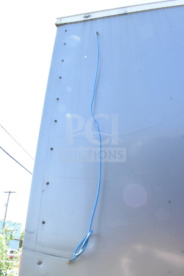 2021 Diamond Cargo 8.5'x24' cold food trailer, grey exterior, visible wiring, VIN 53NBE2424M1089867.