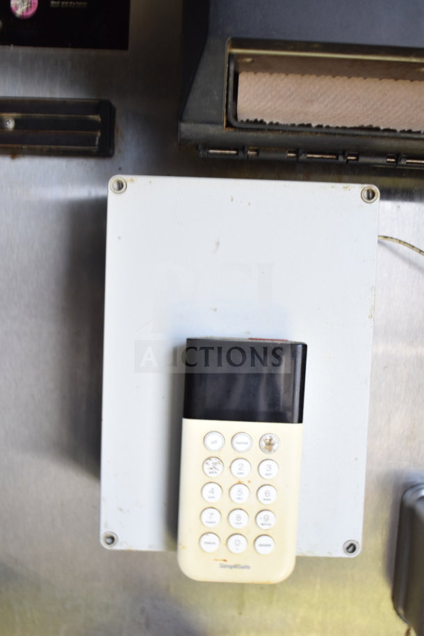 2019 Diamond Cargo 8.5'x24' food trailer interior showing part of the security system console.