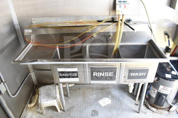 2019 Diamond Cargo 8.5'x24' food trailer sink area with sanitize, rinse, wash sections; includes refrigeration and fryer.