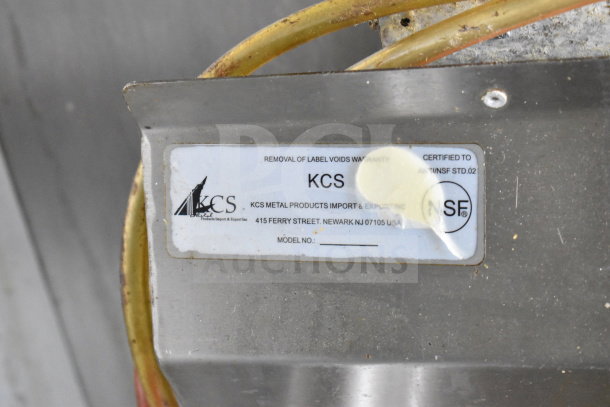 Label on metal component in 2019 Diamond Cargo food trailer, showing KCS Metal Products Import & Export Inc. details.